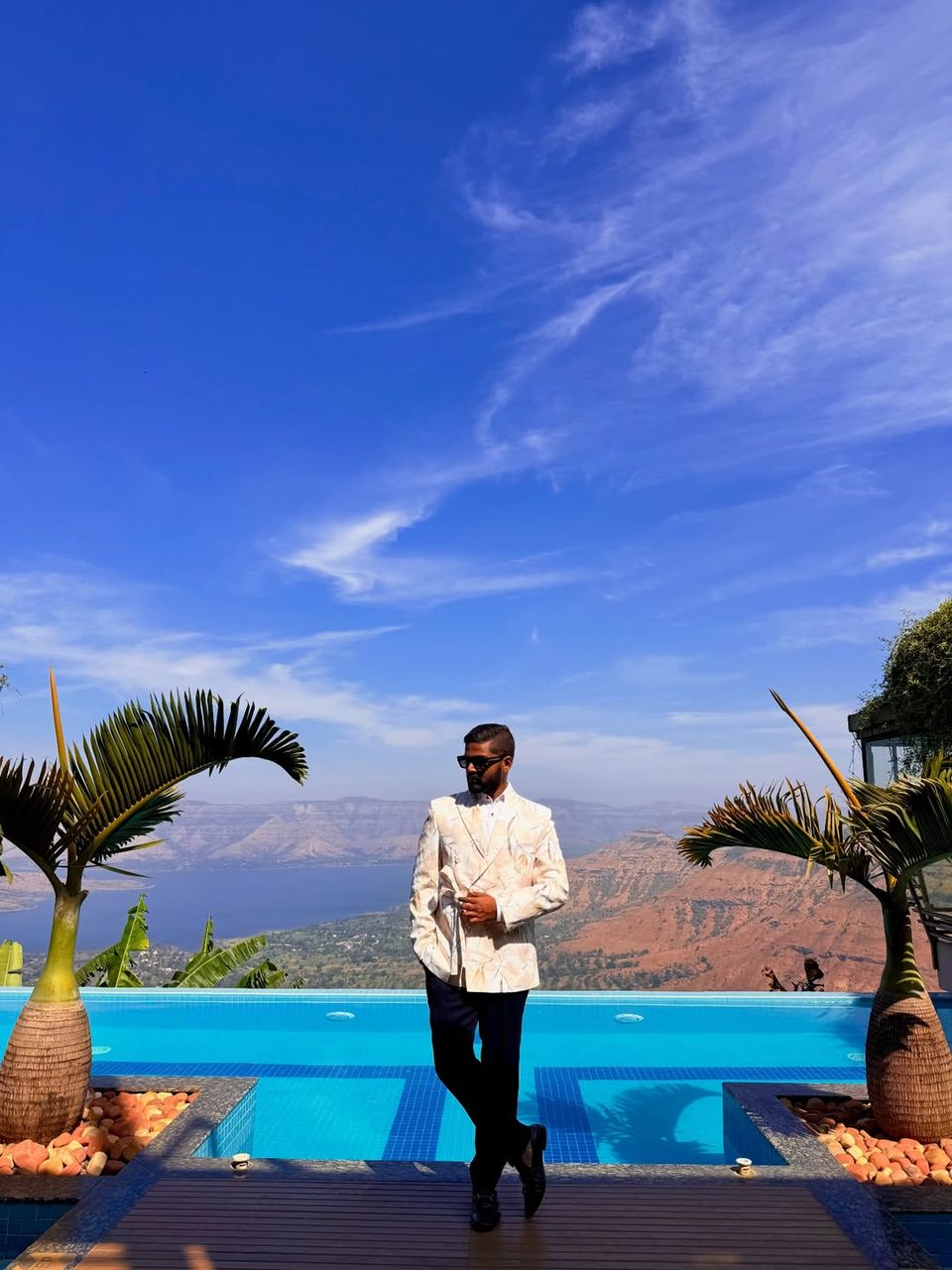 Akshay at a poolside venue