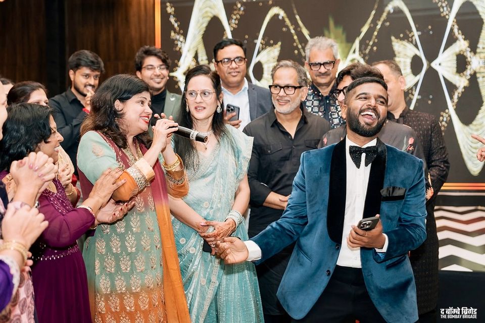 Family singing along with Akshay